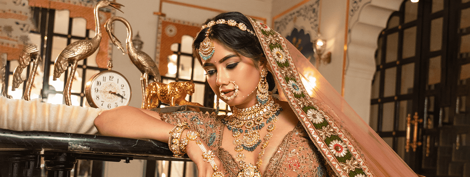 a woman in a bridal gown and jewelry